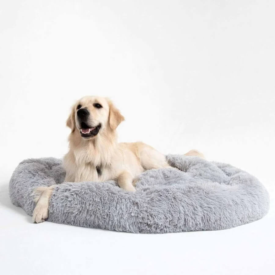 Letto per cani pelosi e morbidi a forma di ciambella