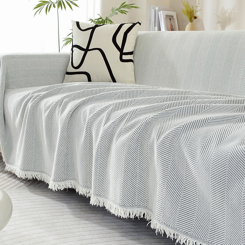 Copertura per divano in chenille con motivo a spina di pesce e frange