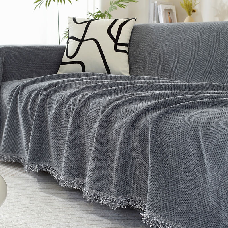 Copertura per divano in chenille con motivo a spina di pesce e frange