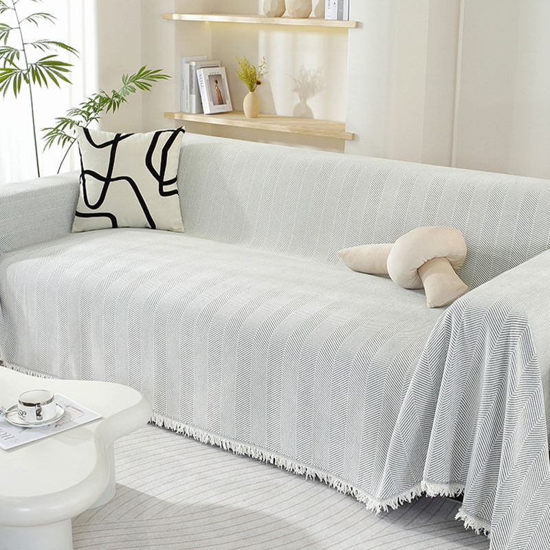 Copertura per divano in chenille con motivo a spina di pesce e frange