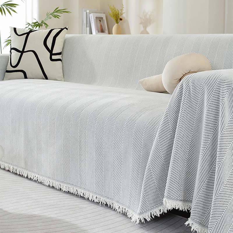Copertura per divano in chenille con motivo a spina di pesce e frange