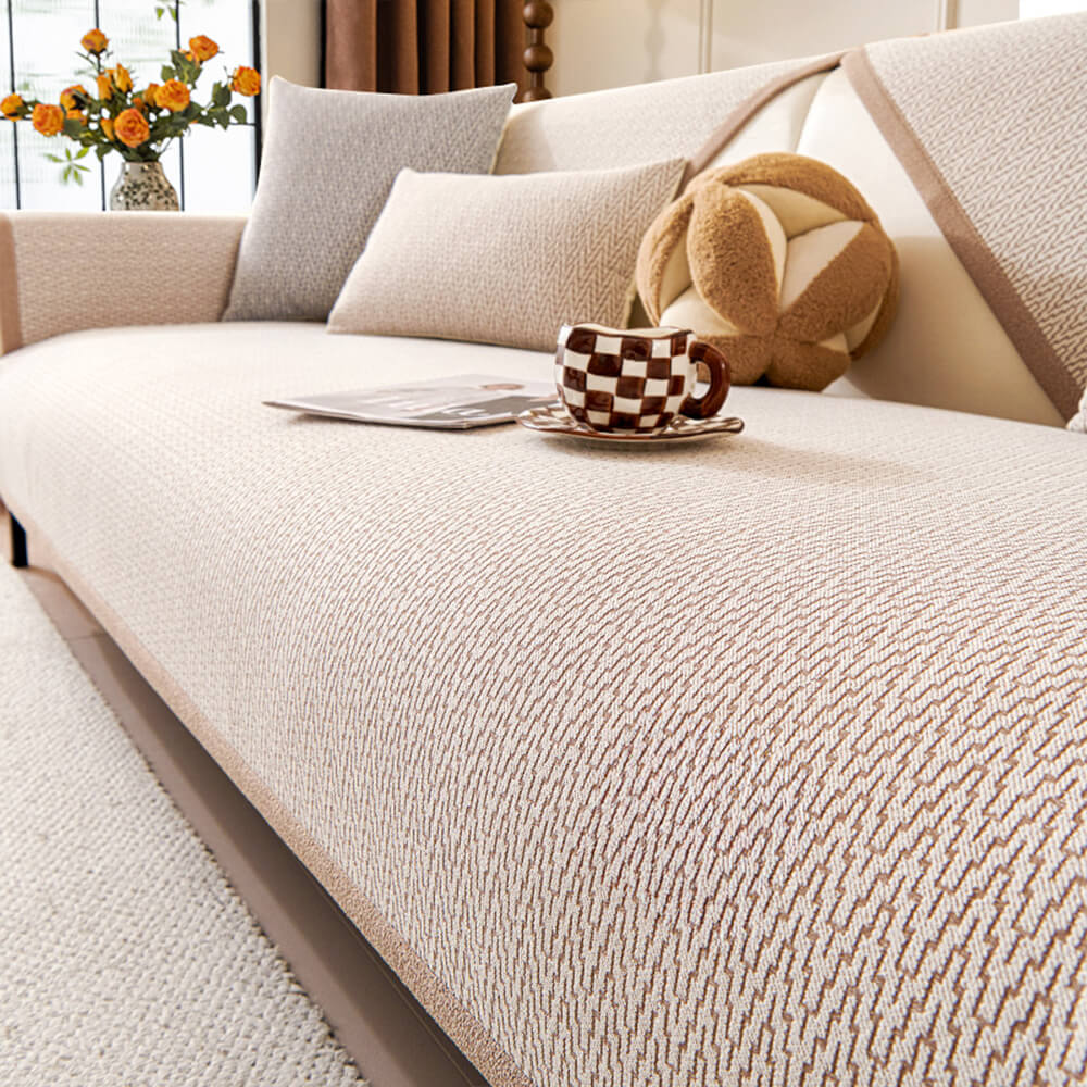 Copertura per divano in tessuto chenille minimalista antiscivolo con design resistente ai graffi dei gatti.