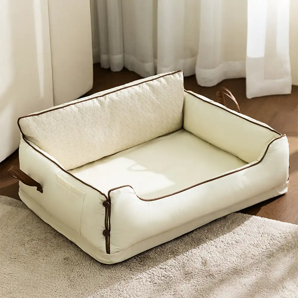 Letto per cani in pelle sintetica impermeabile con schienale protettivo in lattice