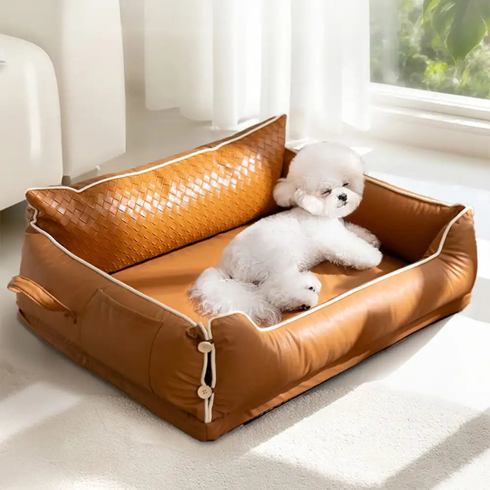 Letto per cani in pelle sintetica impermeabile con schienale protettivo in lattice