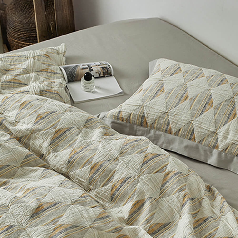 Set di lenzuola in cotone plissettato a doppio strato con jacquard a diamante