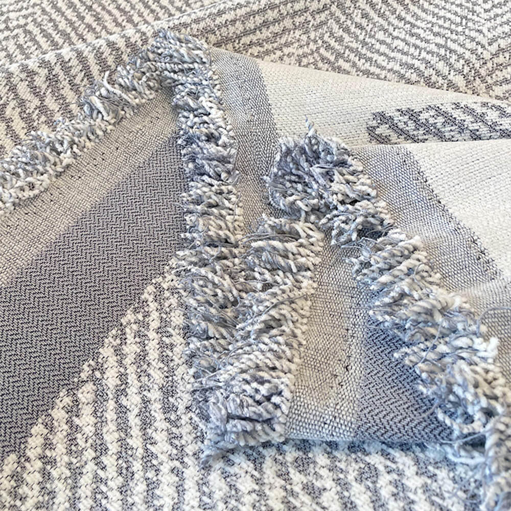 Copertura per divano in chenille frangiata con motivo a chevron