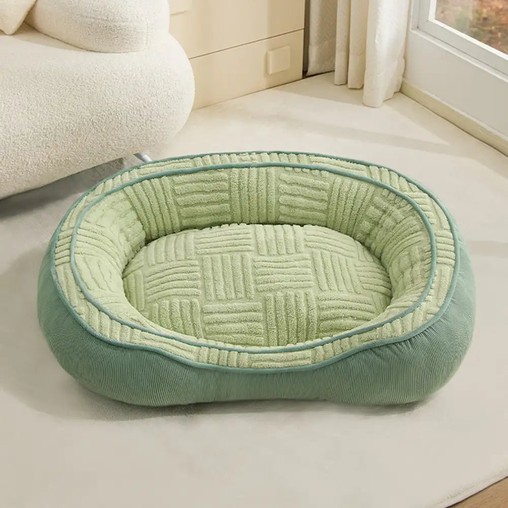 Letto per cani a ciambella in velluto Teddy ovale grande spazio per un sonno profondo e confortevole.