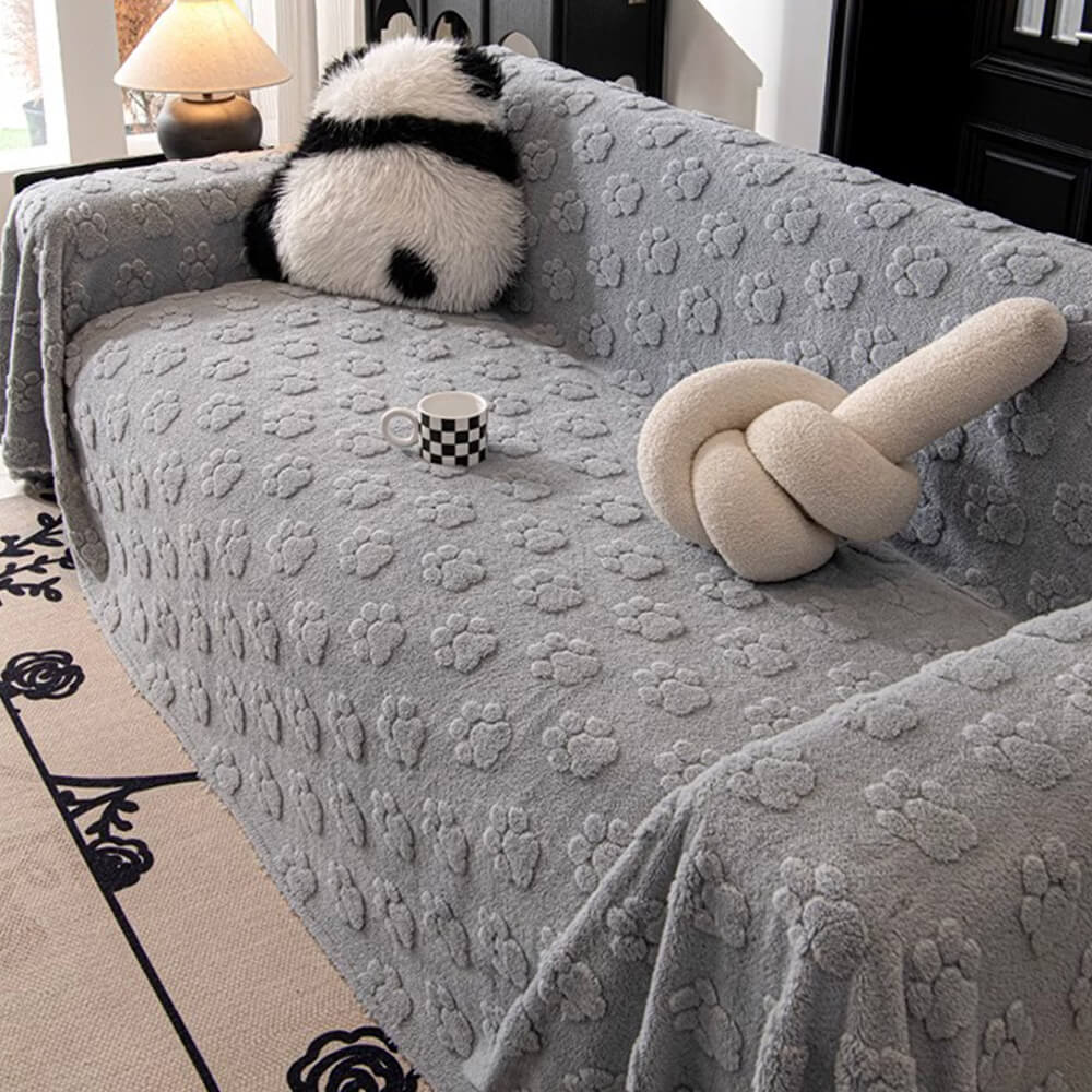 Coprisedile in soffice tessuto con motivo di zampe di peluche