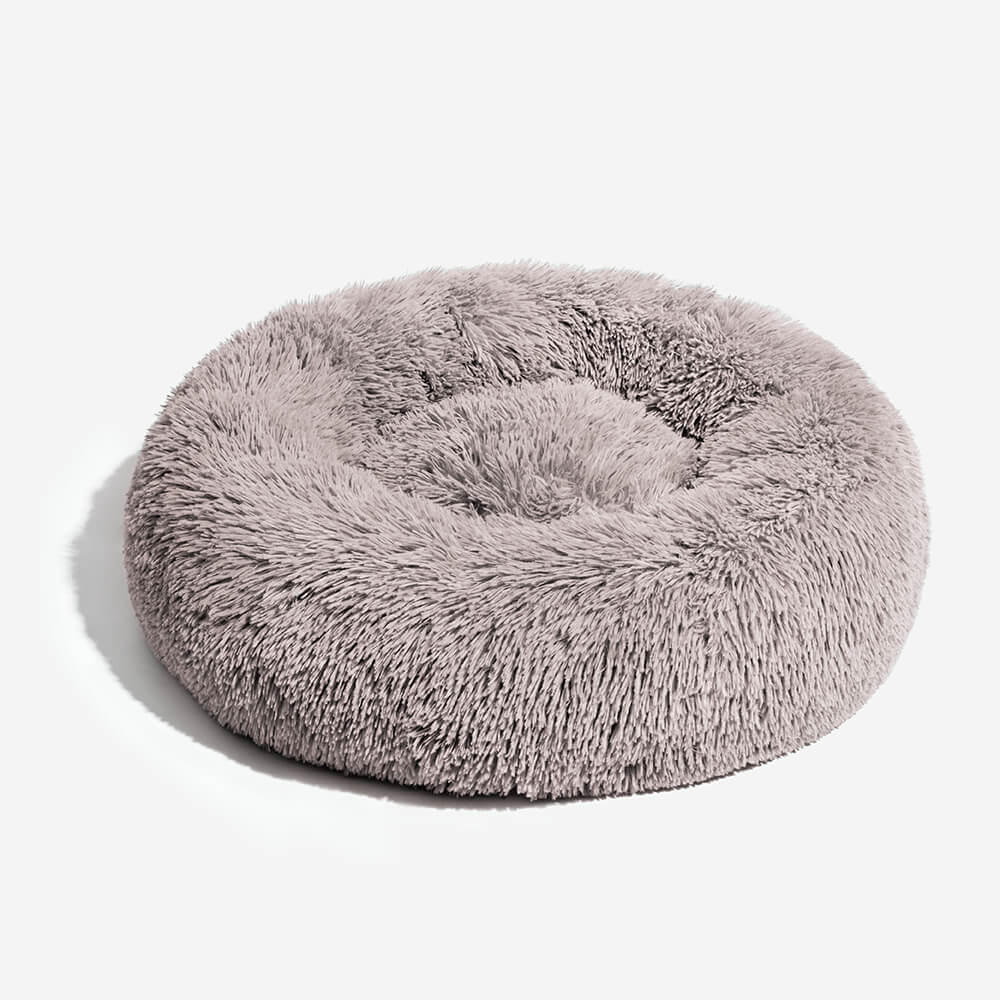 Letto per cani pelosi e morbidi a forma di ciambella
