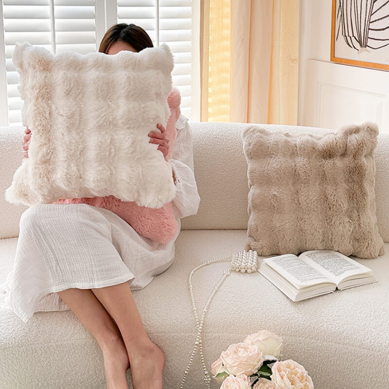 Cuscino in morbido plush reversibile per divano