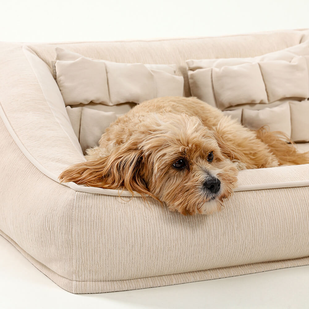 Letto per cani ortopedico di supporto con cuscini.