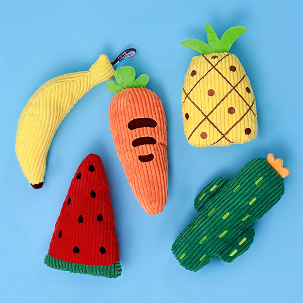 Giocattolo per cani in peluche a forma di frutta, di gomma resistente e schioccante.
