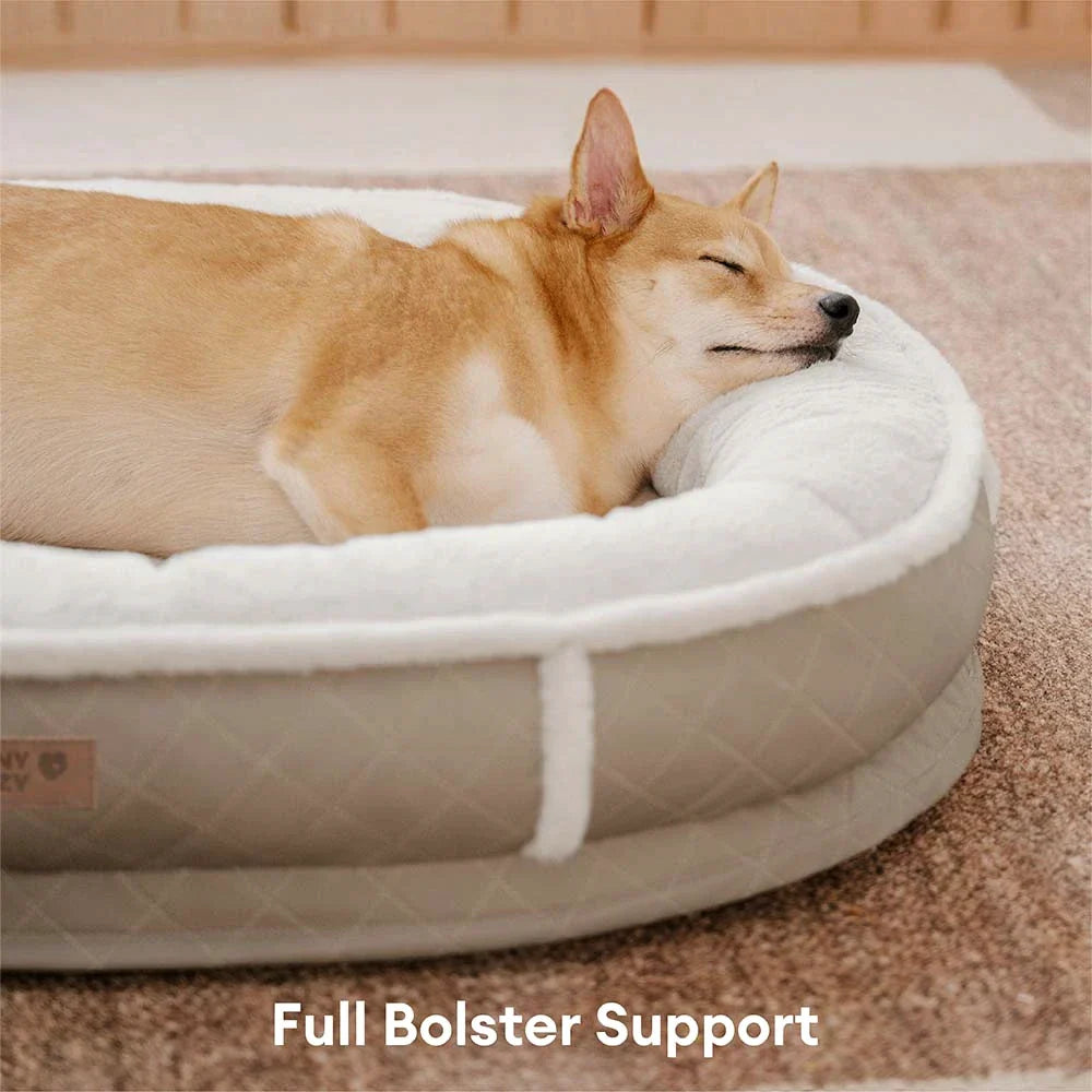 Letto per cani ortopedico a ciambella in finta pelle deluxe e peluche rimovibile - WarmNest