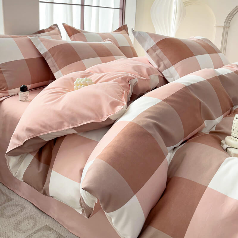 Set di lenzuola traspiranti alla moda con blocco di colore a quadri classici