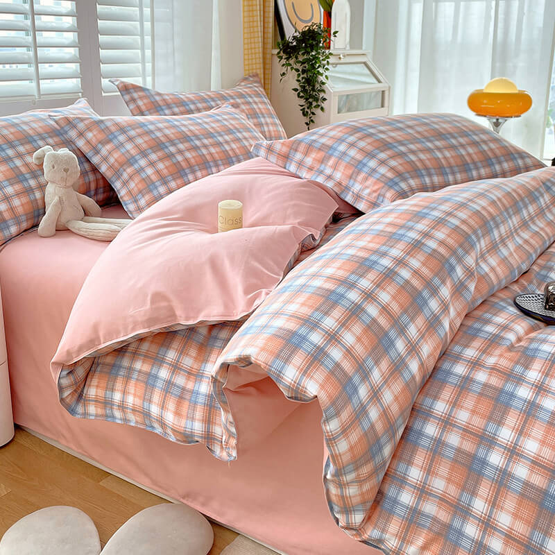 Set di lenzuola traspiranti alla moda con blocco di colore a quadri classici