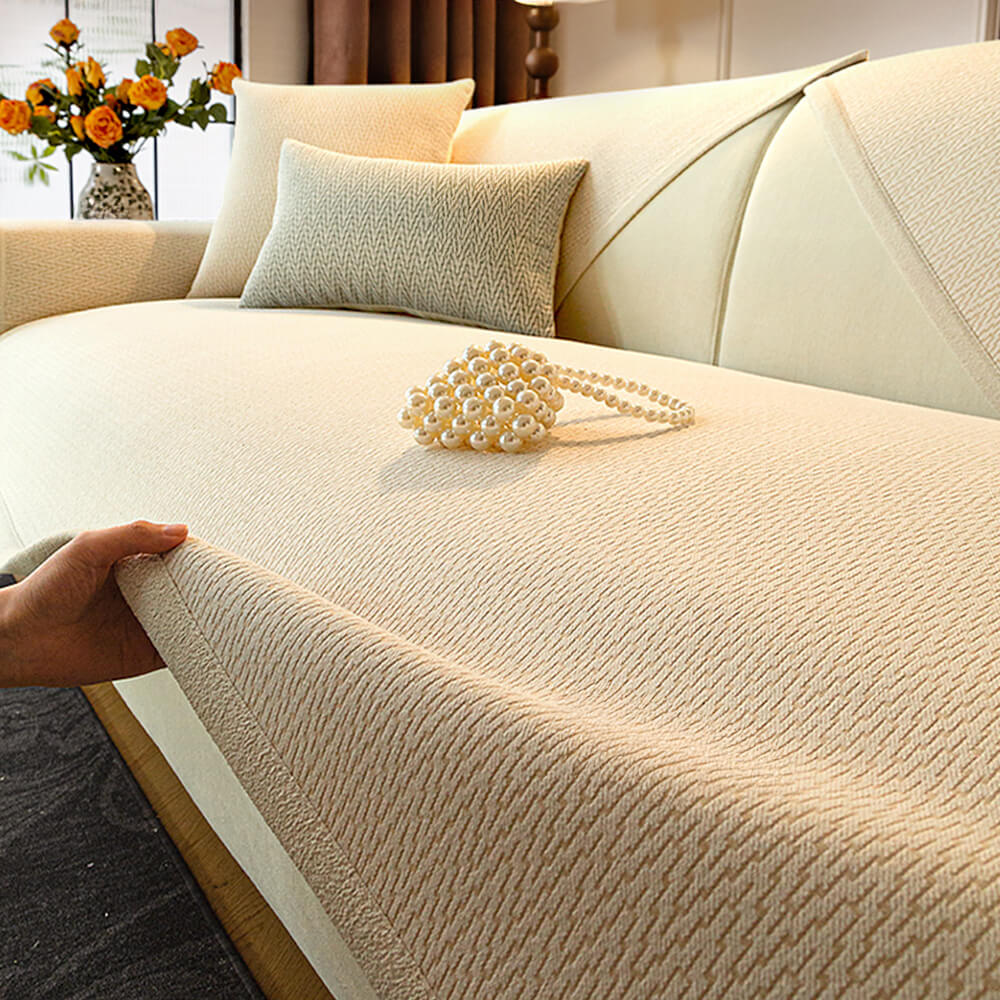 Copertura per divano in tessuto chenille minimalista antiscivolo con design resistente ai graffi dei gatti.