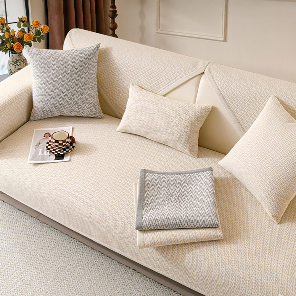 Copertura per divano in tessuto chenille minimalista antiscivolo con design resistente ai graffi dei gatti.