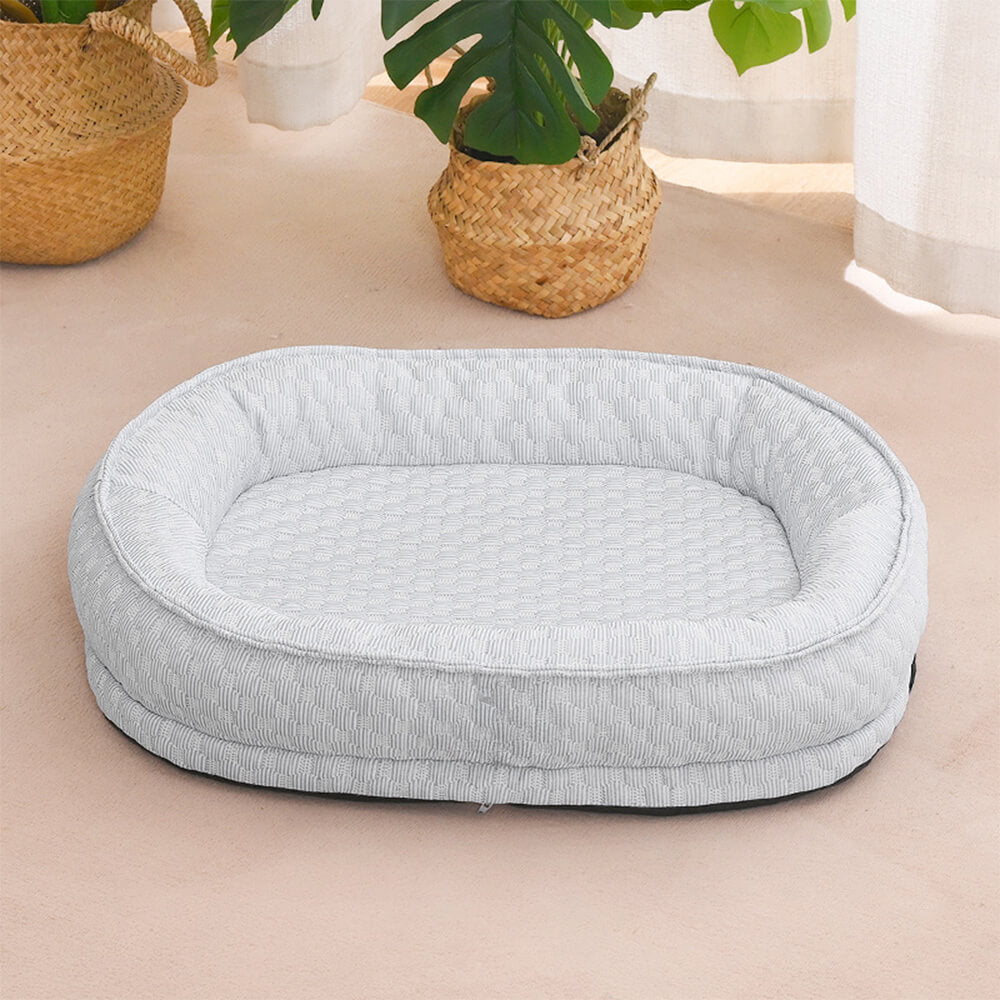 Cuscino per cani ovale a ciambella elevato per comfort rinfrescante