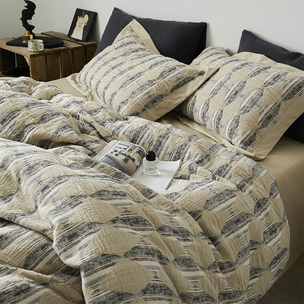 Set di lenzuola in cotone plissettato a doppio strato con jacquard a diamante