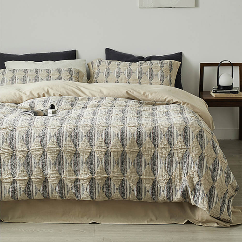 Set di lenzuola in cotone plissettato a doppio strato con jacquard a diamante