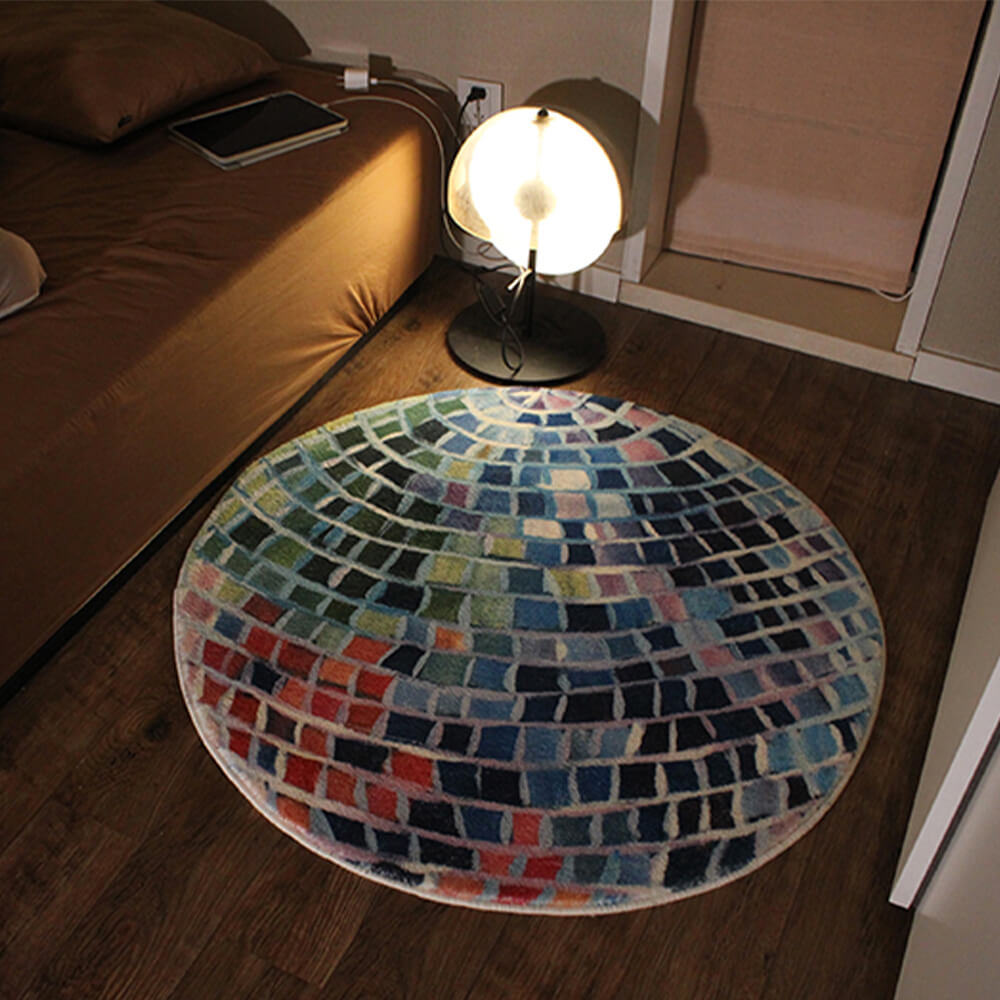 Tappeto rotondo in similcashmere con blocchi di colore a palla discoteca