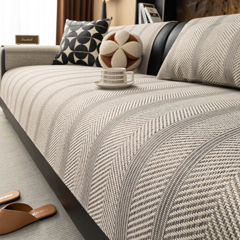 Copertura per divano a tutto tondo in finta lino traspirante con motivo a spina di pesce minimalista.