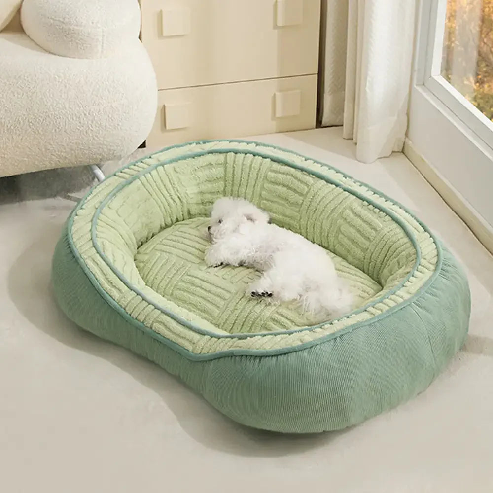 Letto per cani a ciambella in velluto Teddy ovale grande spazio per un sonno profondo e confortevole.