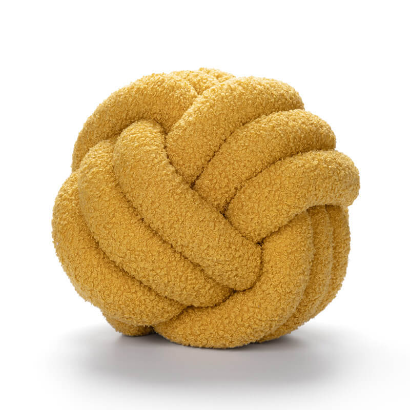 Cuscino per divano con palline annodate in pile lavorato a maglia