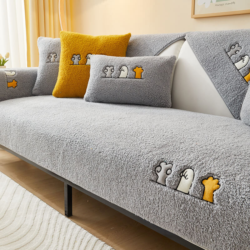 Copertura per divano antiscivolo in sherpa fleece con motivo zampa di gatto adorabile