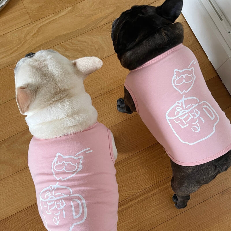 Set di magliette e gilet per cuccioli rosa abbinati per cane e proprietario