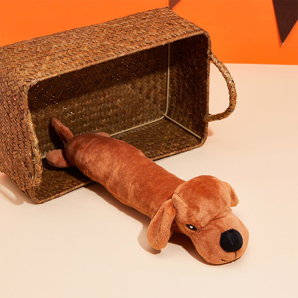 Giocattolo per cani in peluche resistente ai morsi e con squeaker.