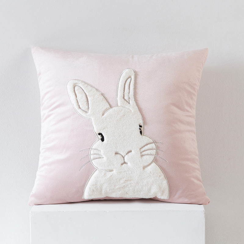 Cuscino in velluto comfort con coniglio.