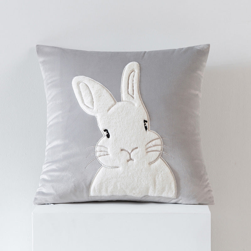 Cuscino in velluto comfort con coniglio.