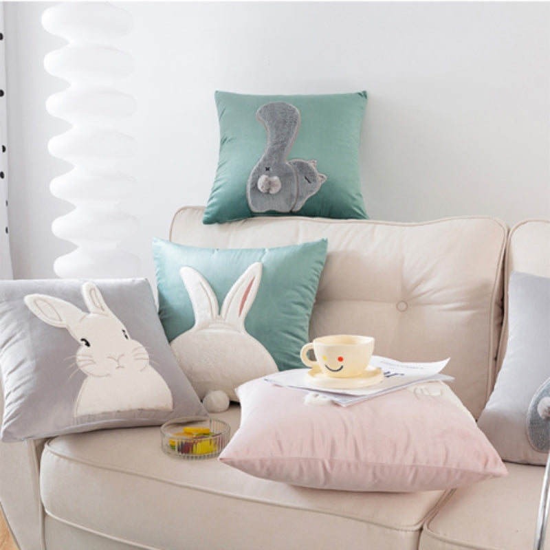 Cuscino in velluto comfort con coniglio.