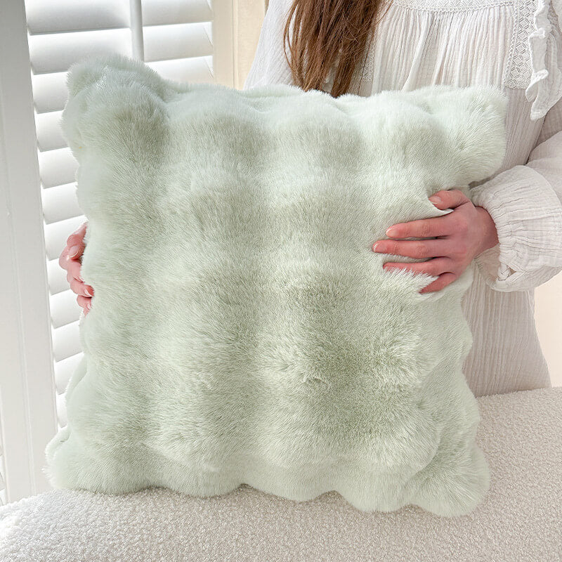 Cuscino in morbido plush reversibile per divano