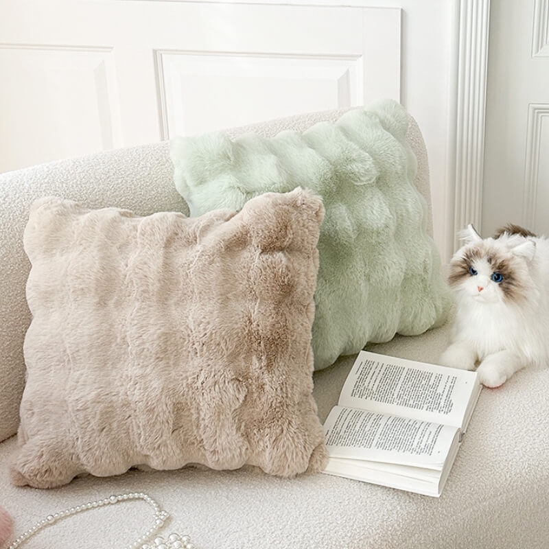 Cuscino in morbido plush reversibile per divano