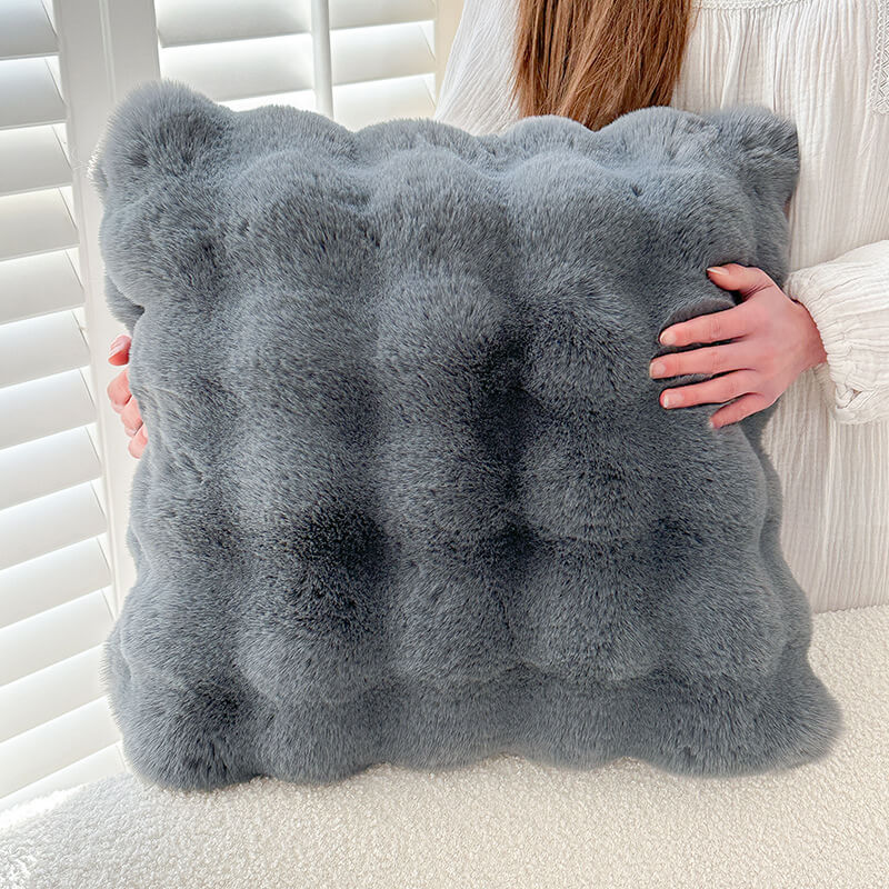 Cuscino in morbido plush reversibile per divano