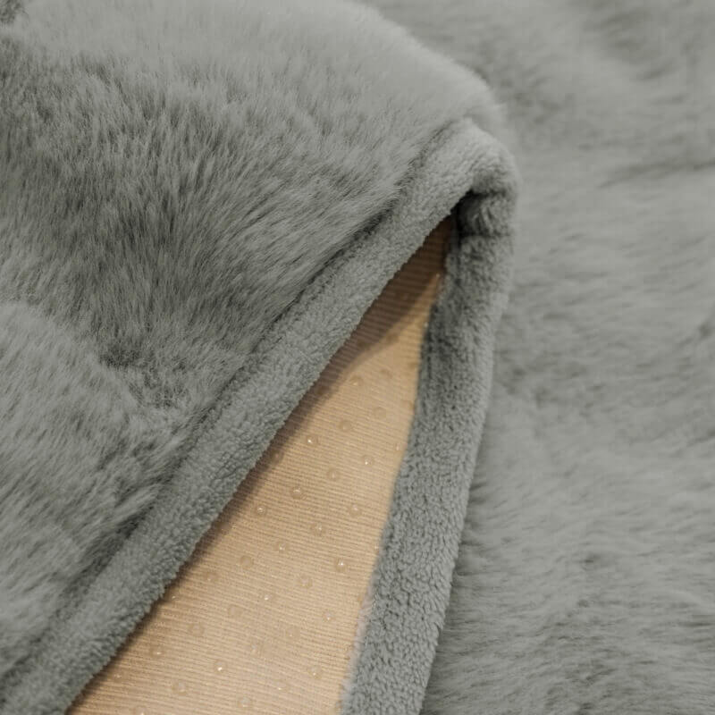 Copertura per divano in pile accogliente, di colore uniforme e antiscivolo