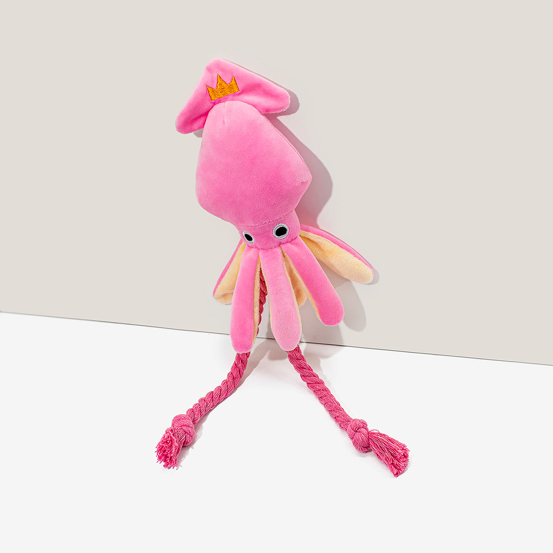 Giocattolo per cani in peluche con stridore di calamari rosa